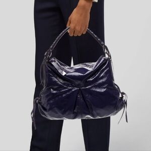 Black crinkle Italian leather hobo bag designed by Francesco Biasia.